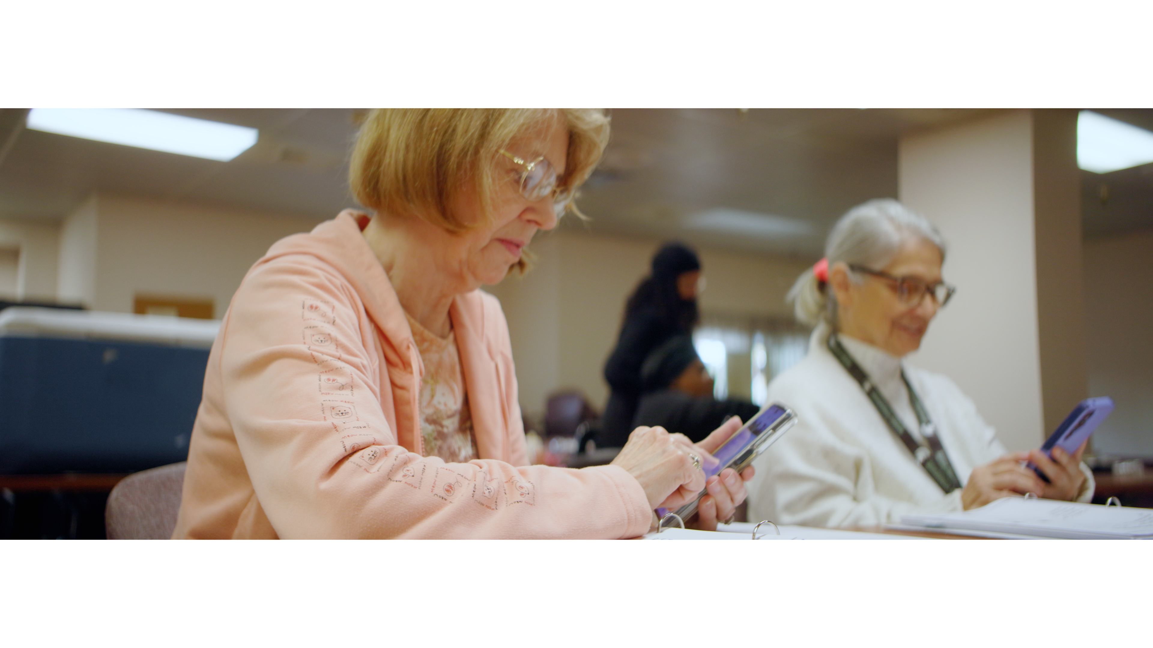 Older adult scrolling on their cellphone 